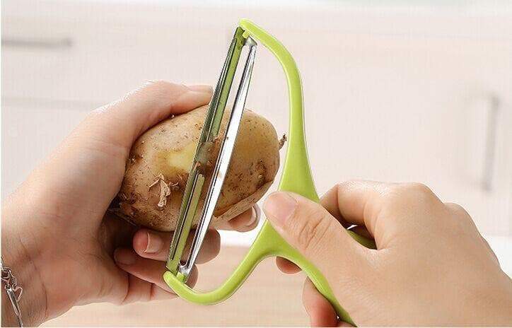 https://my-kitchengadgets.com/cdn/shop/products/stainless-steel-vegetable-cabbage-peeler-3.jpg?v=1695980679